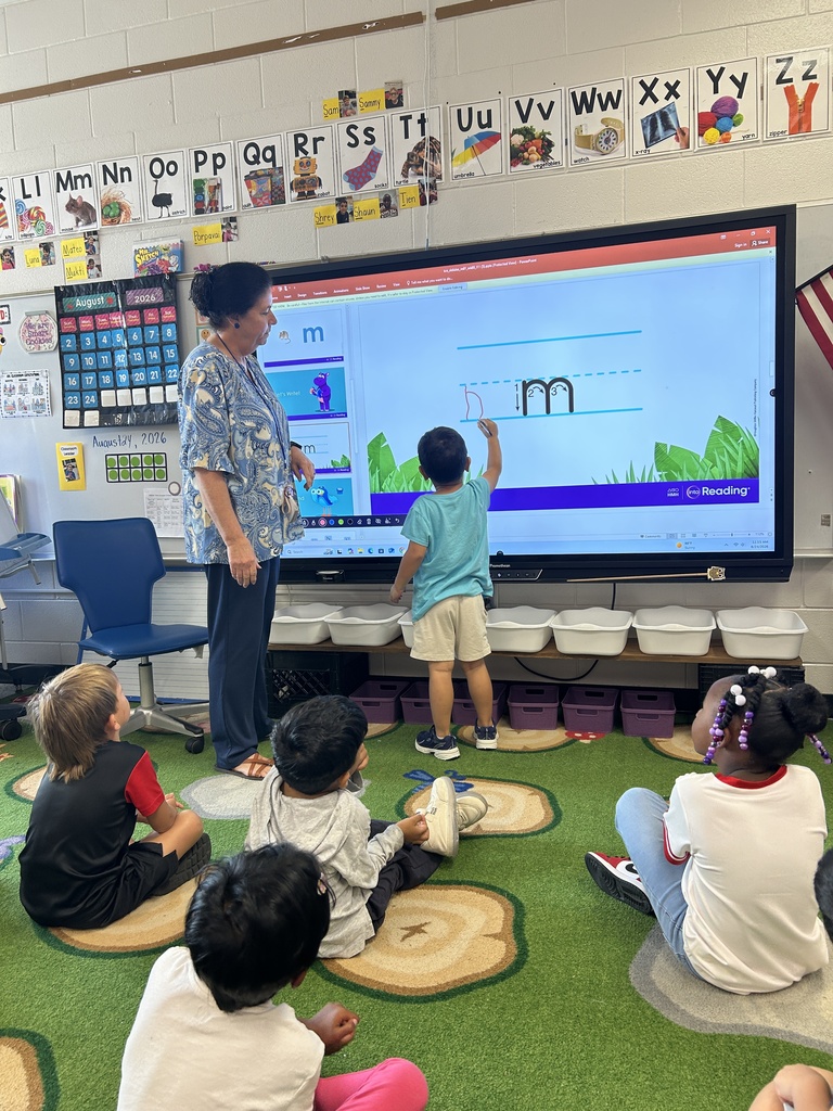 Mrs. Locke's kindergarteners practice their letter writing skills.