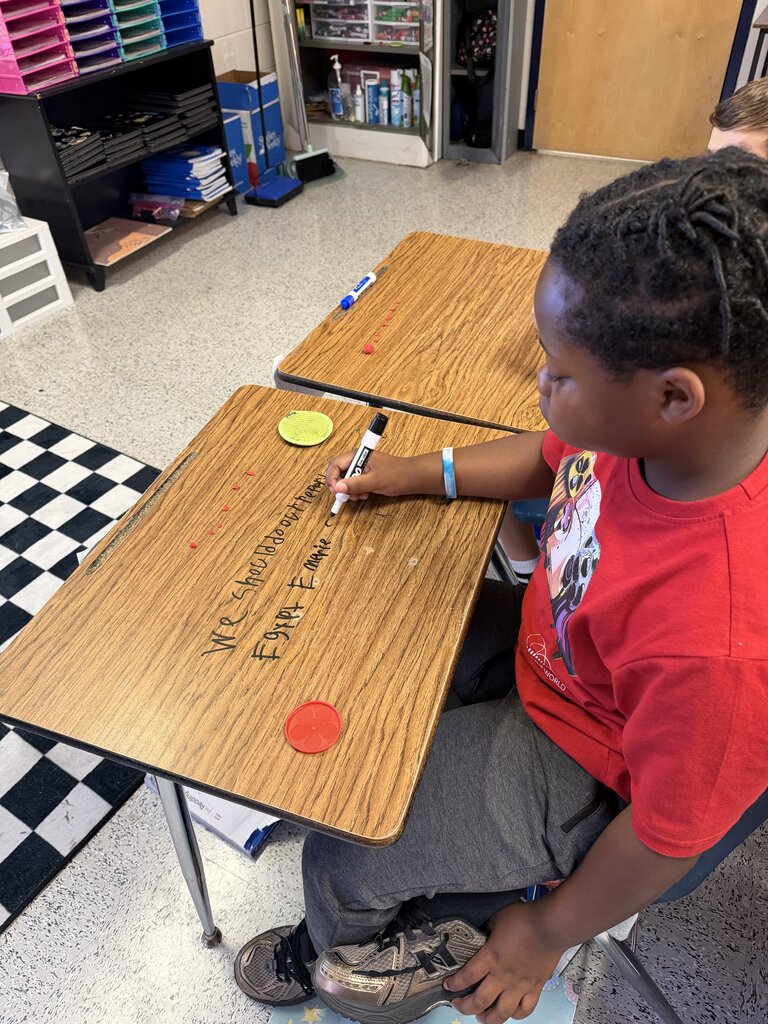 Students use play-doh to practice the use of quotation marks!