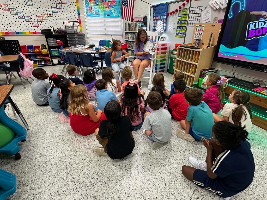 Ms. McCurdy's class has a guest reader.
