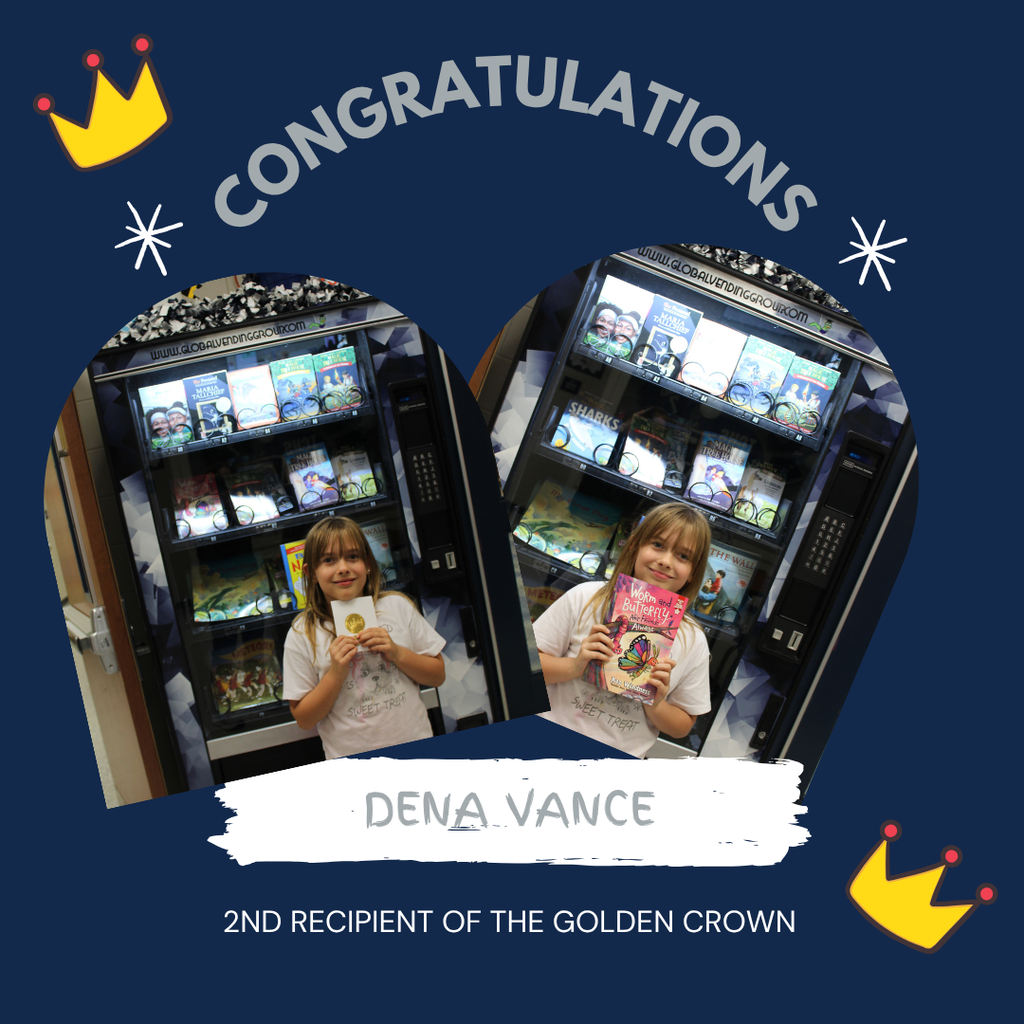 Omega Elementary School golden crown recipient for a free book from the vending machine.