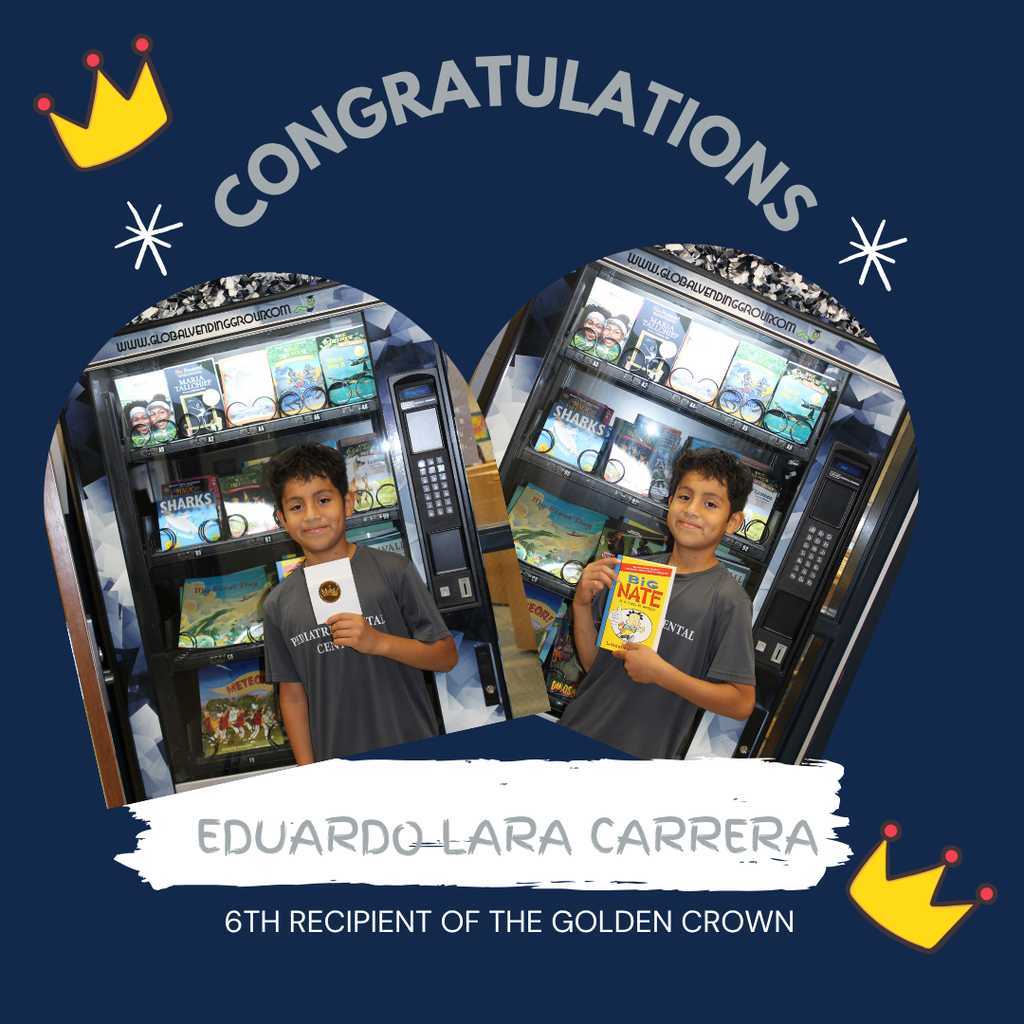 Omega Elementary School golden crown recipient for a free book from the vending machine.