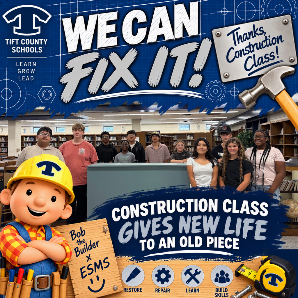 ESMS Construction Class students pose with a piece of furniture they restored. Students stripped the old paint, sanded the piece to the original wood, repaired damaged areas, and repainted it as part of a hands-on learning project.