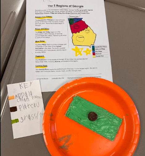 It was a FUN FRIDAY in Mrs. Smith’s 2nd Grade classroom! Today, students had a blast reviewing text features and Georgia’s 5 Regions! To bring our learning to life, students created their very own Appalachian Plateau models! 🏔️ They used Graham Crackers to represent the land, green icing for the grass and trees, and Rolos to represent the plateau.Our 2nd graders had so much fun learning, creating, and showing what they know! 💚📖🍫