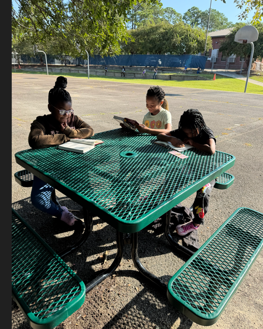 Students reading in honor of GA Reads Day 2026.