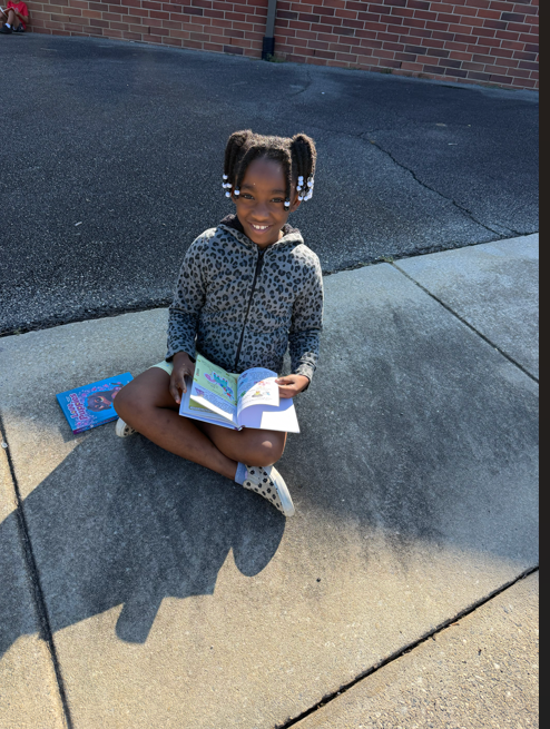 Students reading in honor of GA Reads Day 2026.