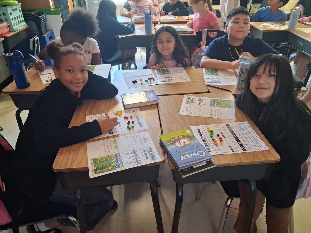 Omega Elementary School students practicing math skills.