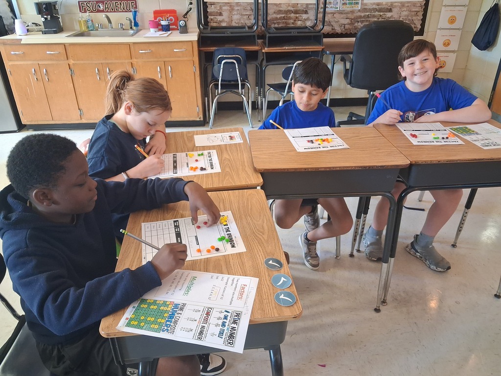 Omega Elementary School students practicing math skills.