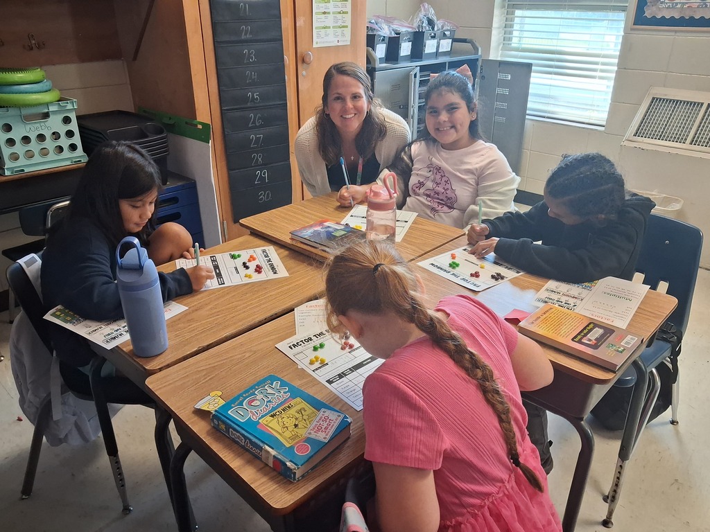Omega Elementary School students practicing math skills.