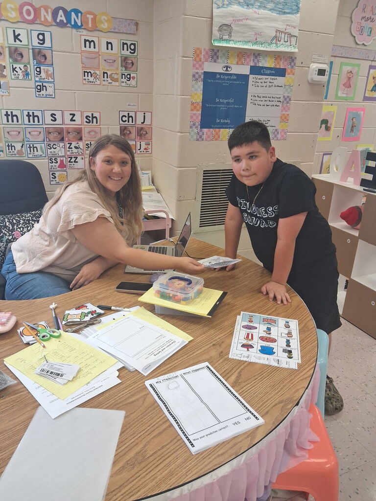 Omega Elementary School Kindness Squad spreading color. 