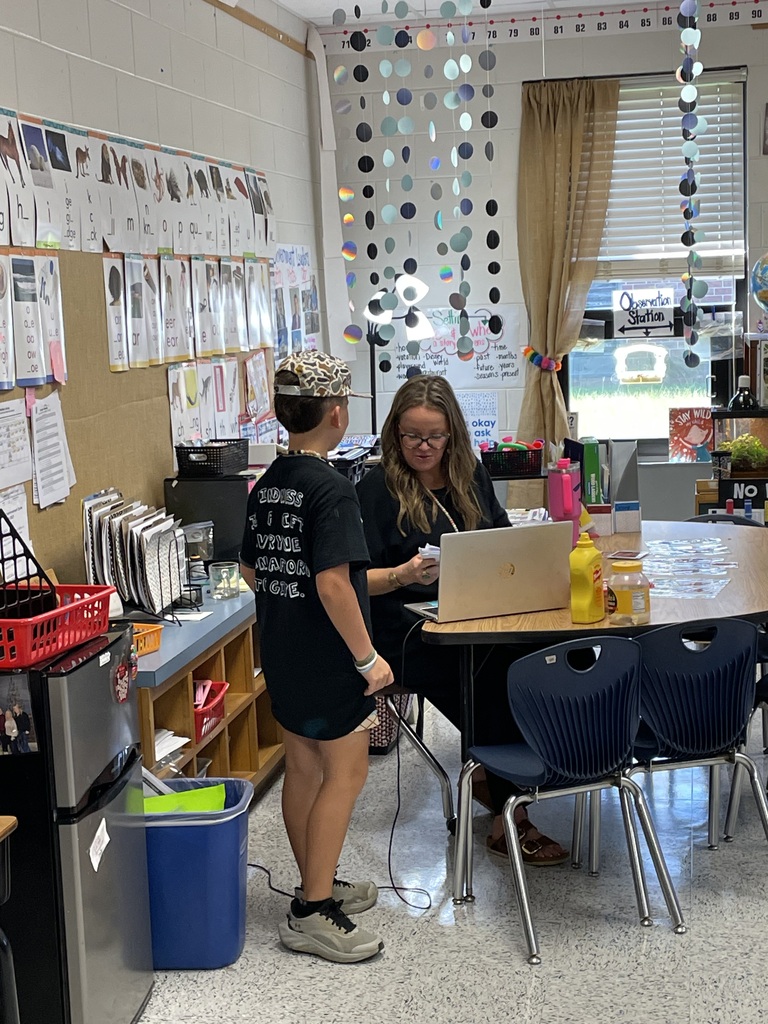 Omega Elementary School Kindness Squad spreading color.