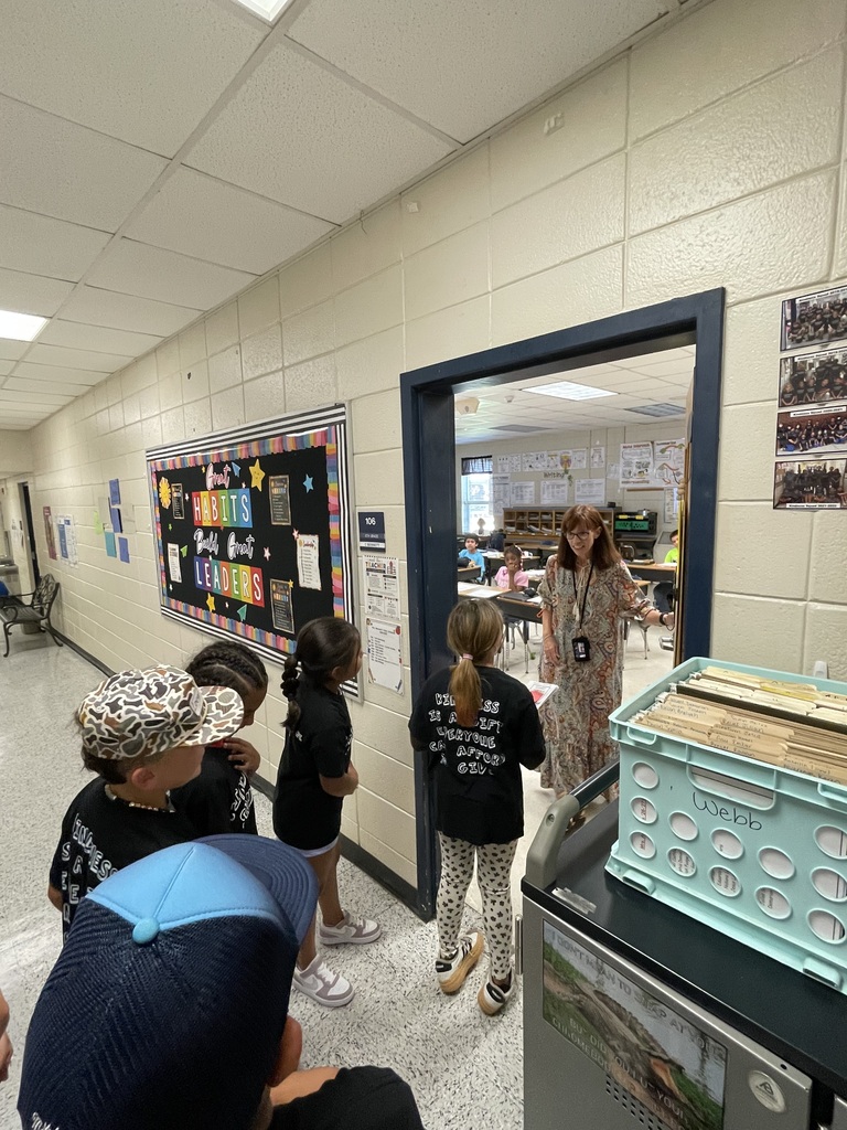 Omega Elementary School Kindness Squad spreading color.