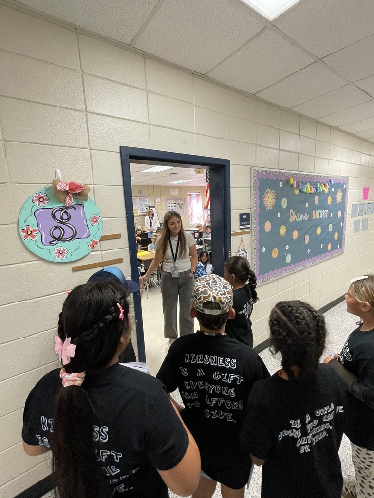 Omega Elementary School Kindness Squad spreading color.
