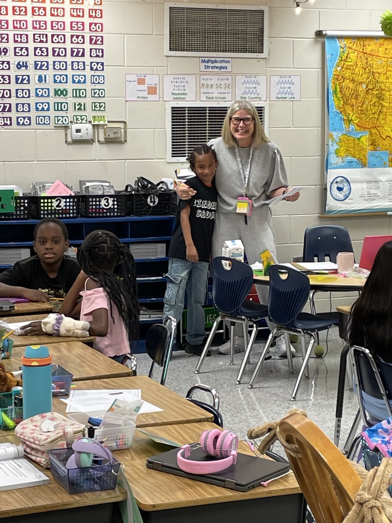 Omega Elementary School Kindness Squad spreading color.