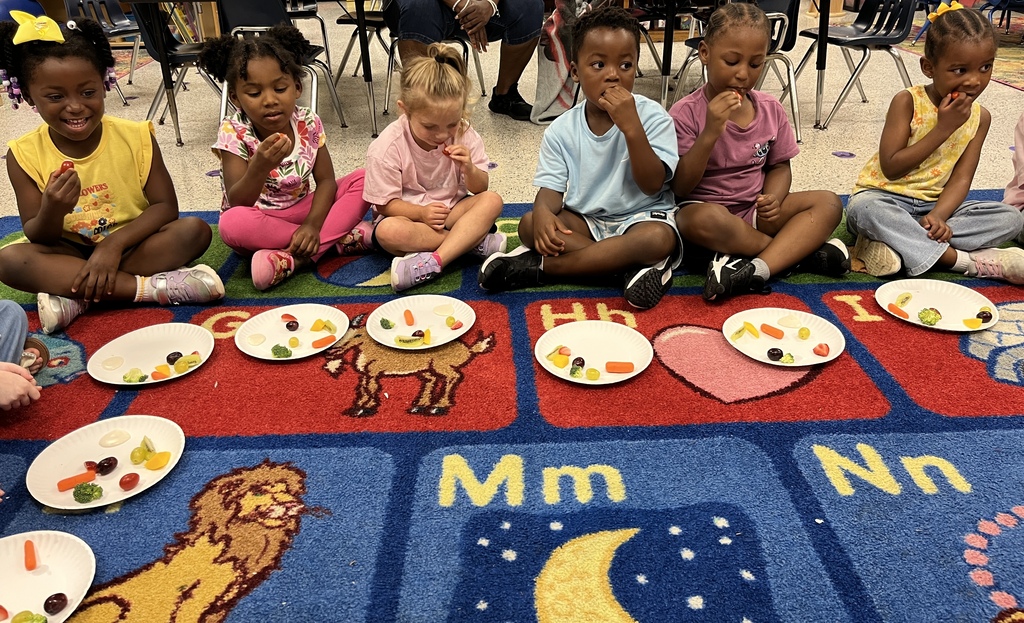 This week, Ms. Elisa and Ms. McCall's Pre-K class learned about making healthy choices, including eating nutritious foods and practicing good hygiene. 🥦🧼 Today, they enjoyed some “healthy popsicles” and held a taste test featuring sweet tomatoes, broccoli, carrots, strawberries, purple grapes, cotton candy grapes, kiwi, and mango. 🍓🥕🥝🥭 Afterward, they recorded which foods they liked. When the children tasted the cotton candy grapes, one said, “You tricked us! These taste like cotton candy, but there’s no cotton candy inside!” 🍇 That fun surprise explains some of their silly faces! 😄 #wearejtr #4theT