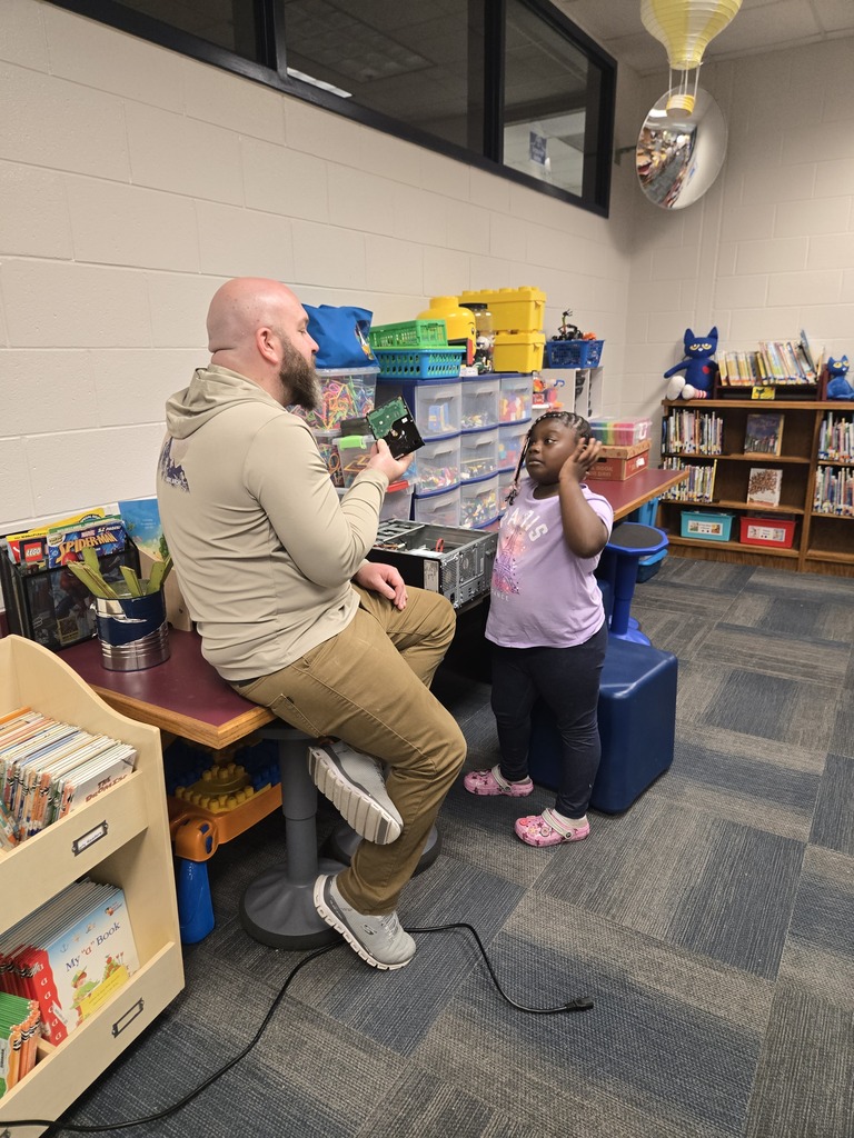 Reagan enjoys Tech Time with Mr. Kyle!
