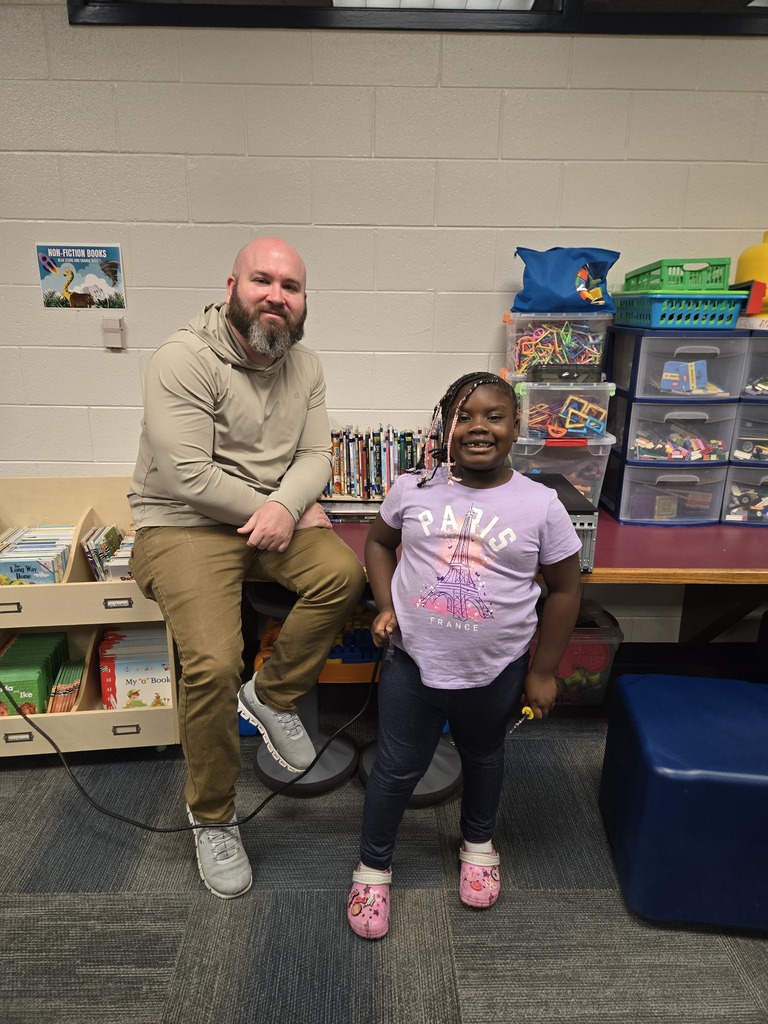 Reagan enjoys Tech Time with Mr. Kyle!