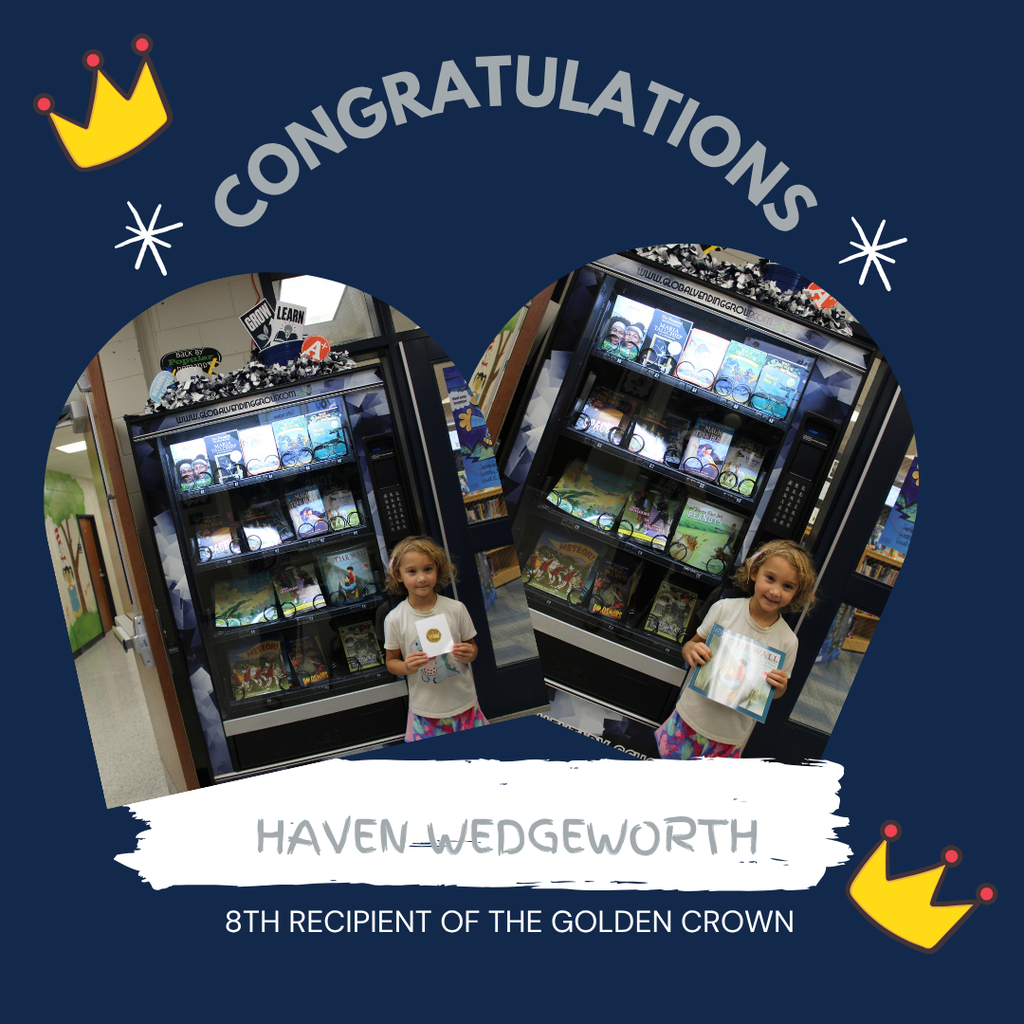 Omega Elementary School golden crown recipient for a free book from the vending machine.