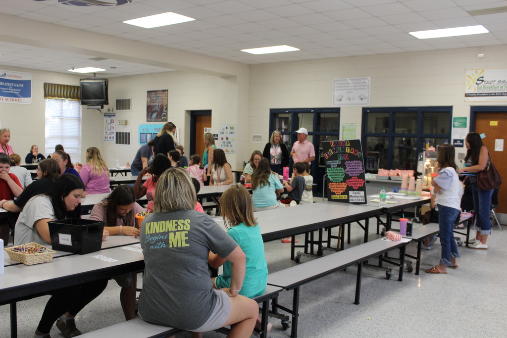 Omega Elementary School Literacy Night and Book Fair with students and parents. 