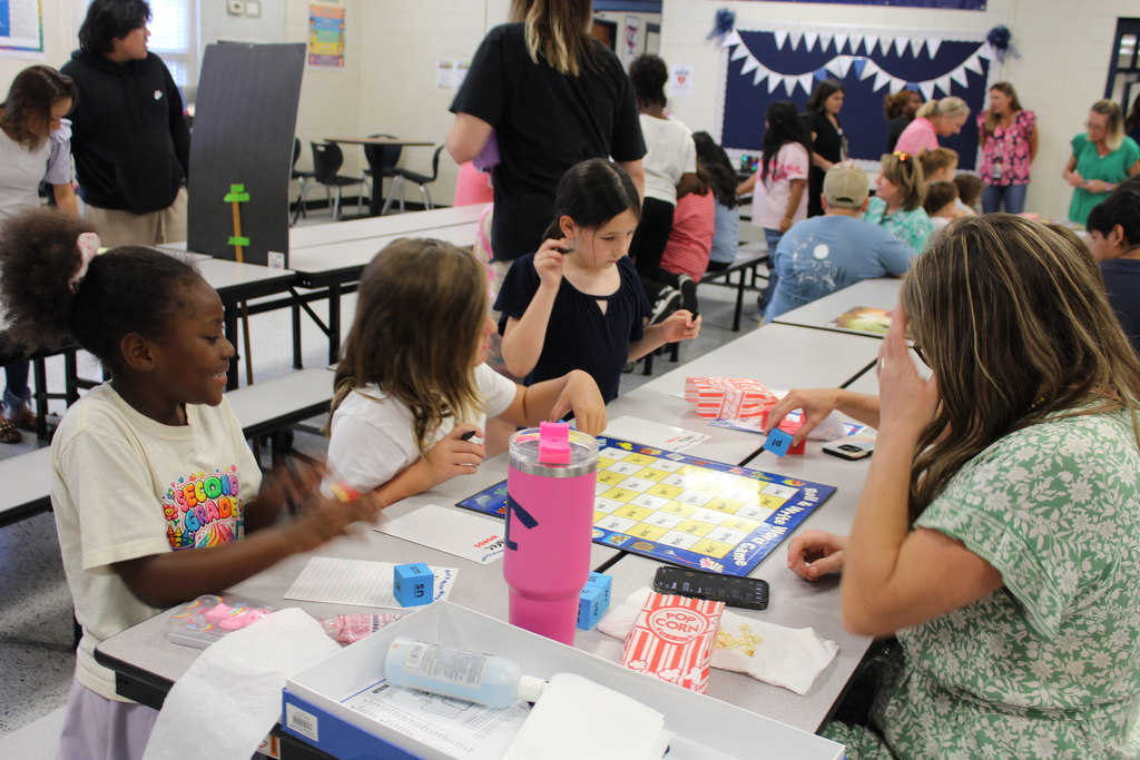 Omega Elementary School Literacy Night and Book Fair with students and parents. 