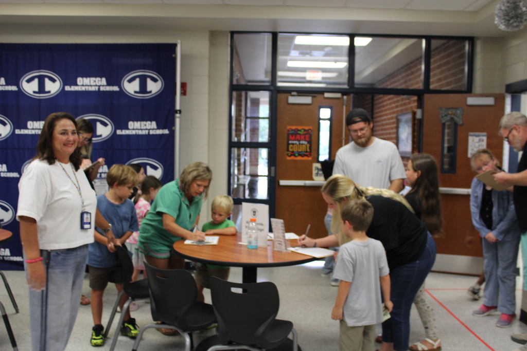 Omega Elementary School Literacy Night and Book Fair with students and parents. 