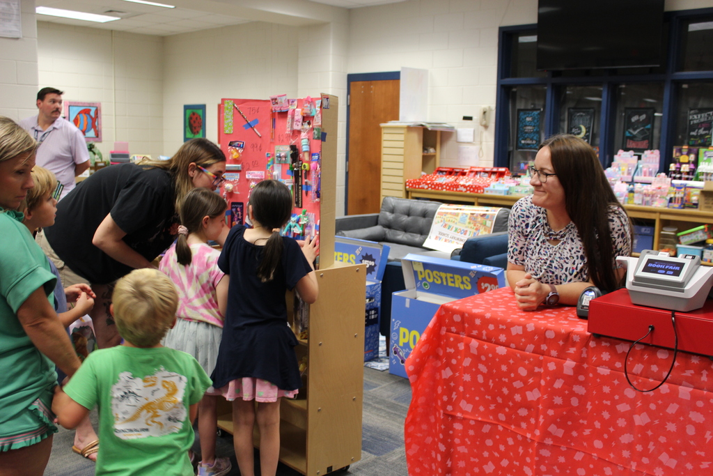 Omega Elementary School Literacy Night and Book Fair with students and parents. 
