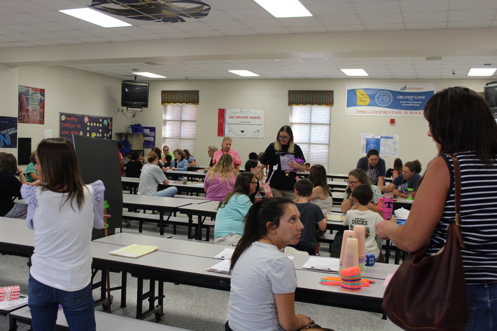 Omega Elementary School Literacy Night and Book Fair with students and parents. 