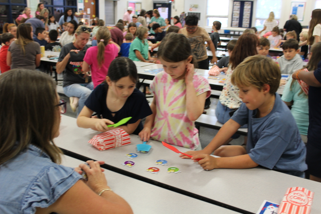 Omega Elementary School Literacy Night and Book Fair with students and parents. 