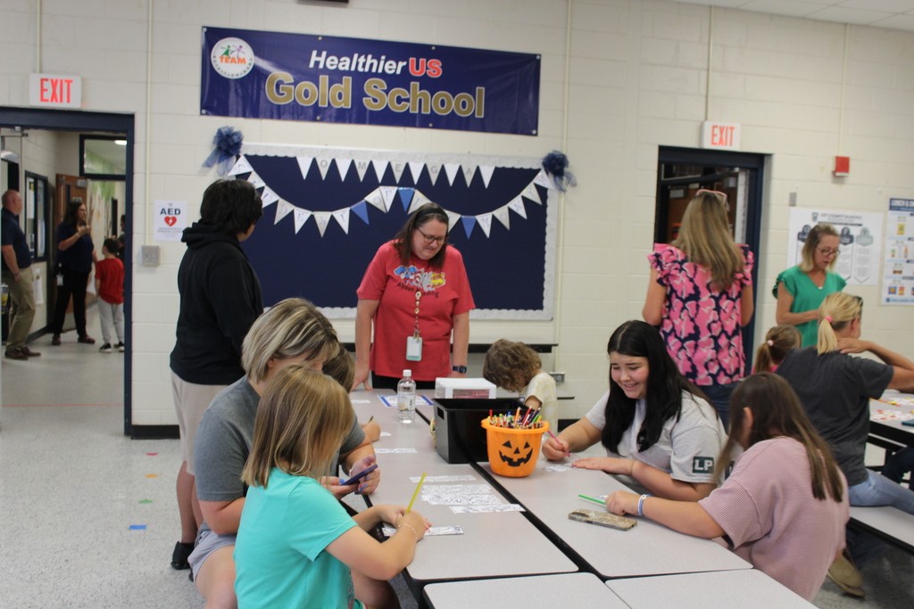 Omega Elementary School Literacy Night and Book Fair with students and parents. 