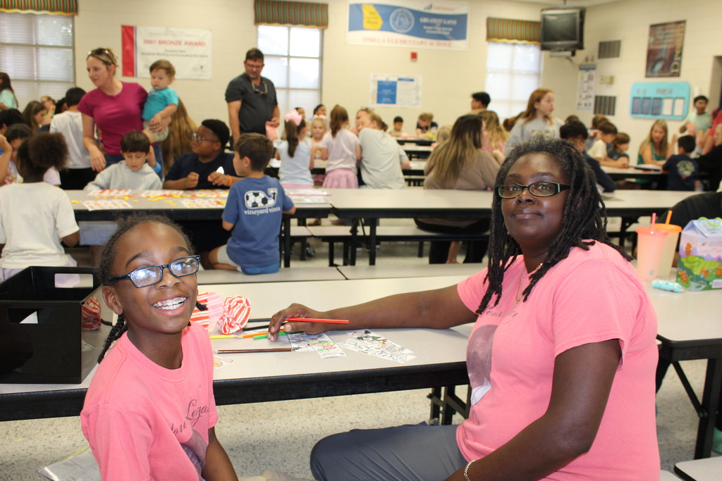 Omega Elementary School Literacy Night and Book Fair with students and parents. 