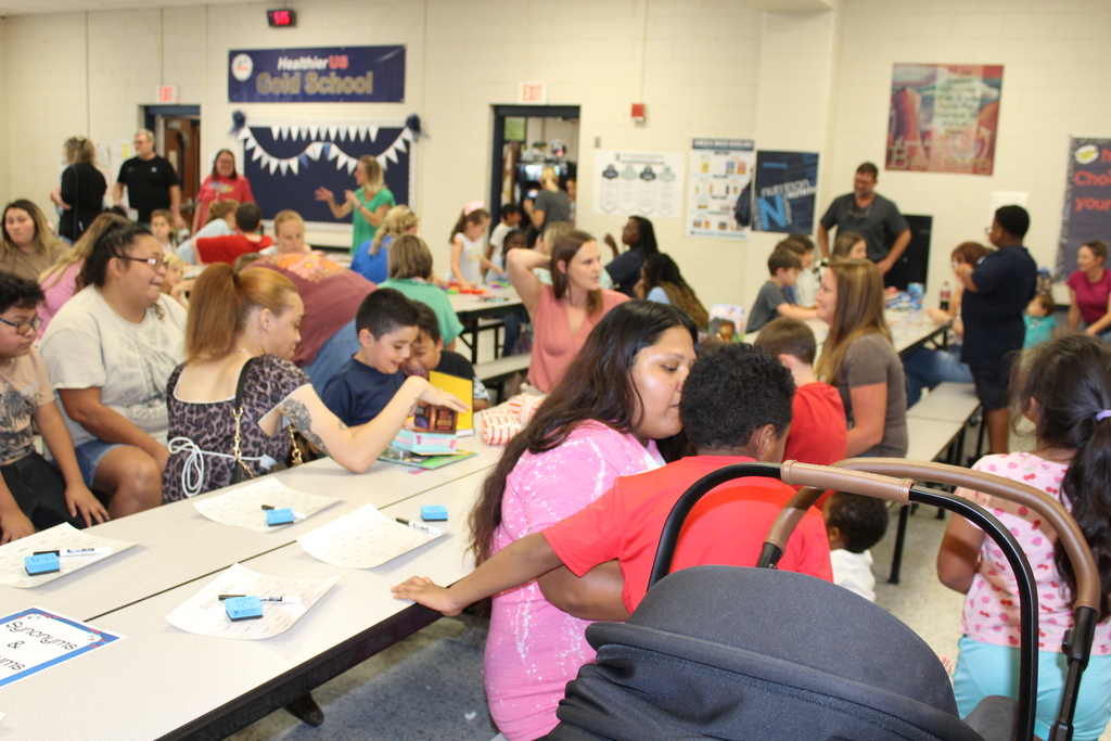 Omega Elementary School Literacy Night and Book Fair with students and parents. 