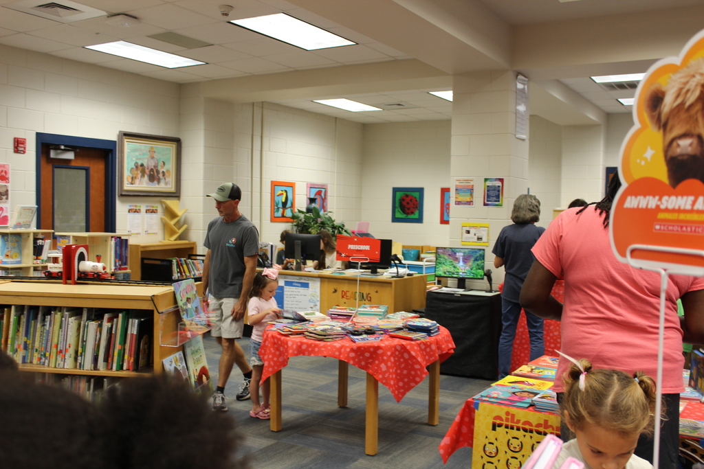 Omega Elementary School Literacy Night and Book Fair with students and parents. 