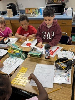Omega Elementary School 3rd graders practicing multiplication.