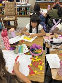 Omega Elementary School 3rd graders practicing multiplication.