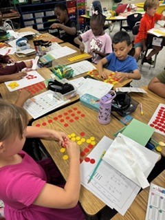 Omega Elementary School 3rd graders practicing multiplication.