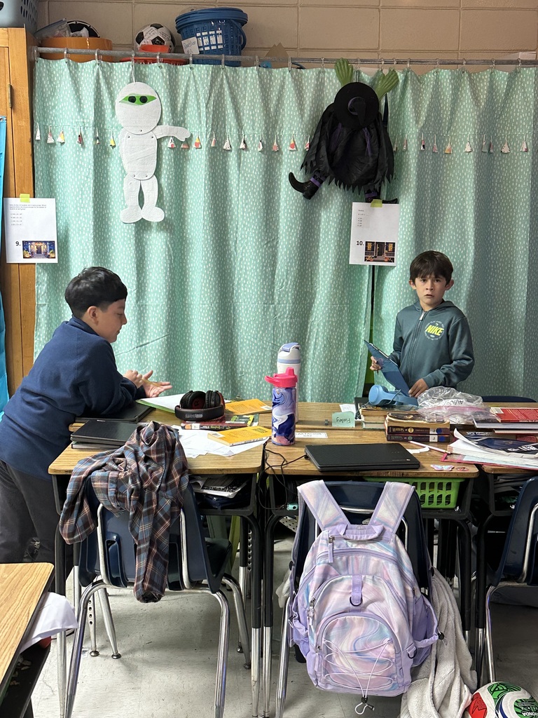 Omega 4th graders working on math task cards in Ms. Dunn's class.