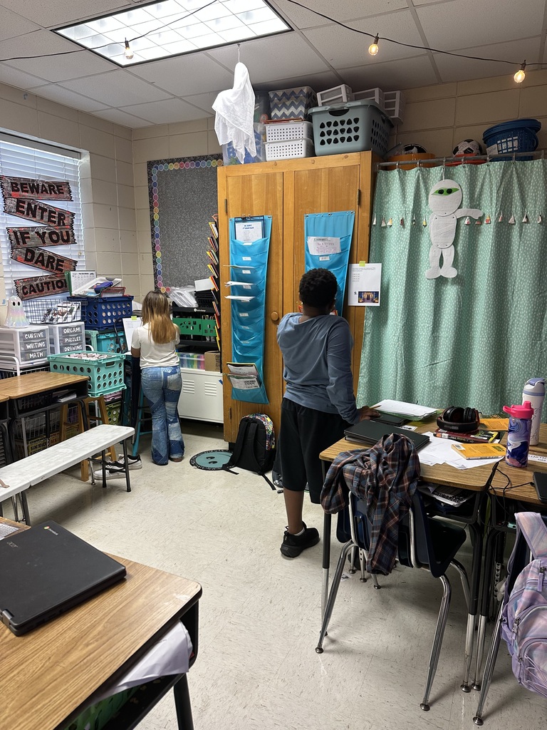 Omega 4th graders working on math task cards in Ms. Dunn's class.