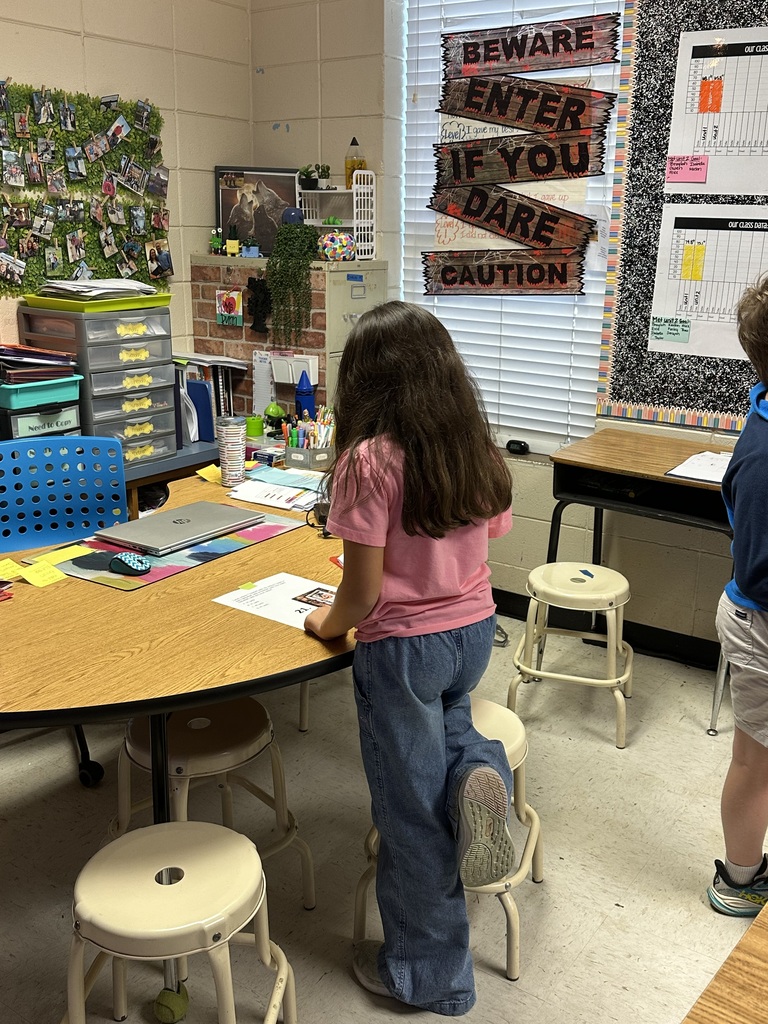 Omega 4th graders working on math task cards in Ms. Dunn's class.