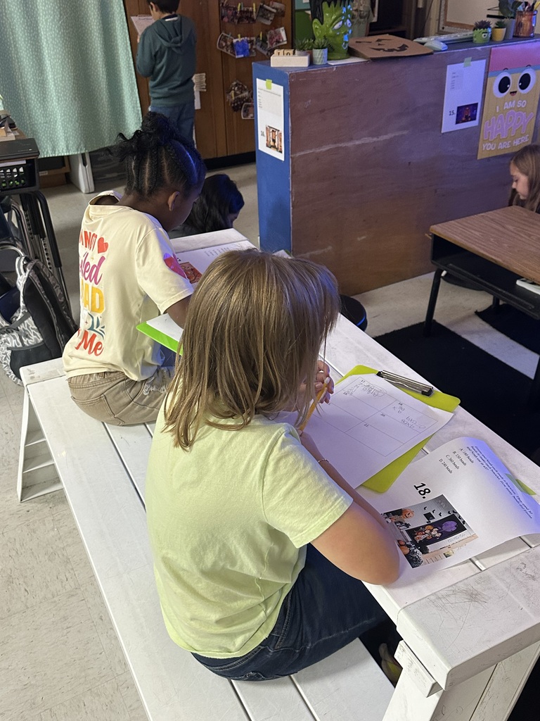 Omega 4th graders working on math task cards in Ms. Dunn's class.
