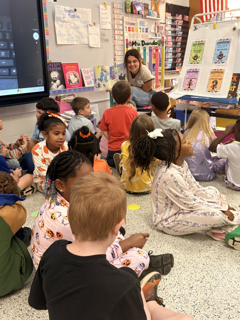 Ms. Duncan visit Mrs. Deanda's first grade class for a read aloud and activity.