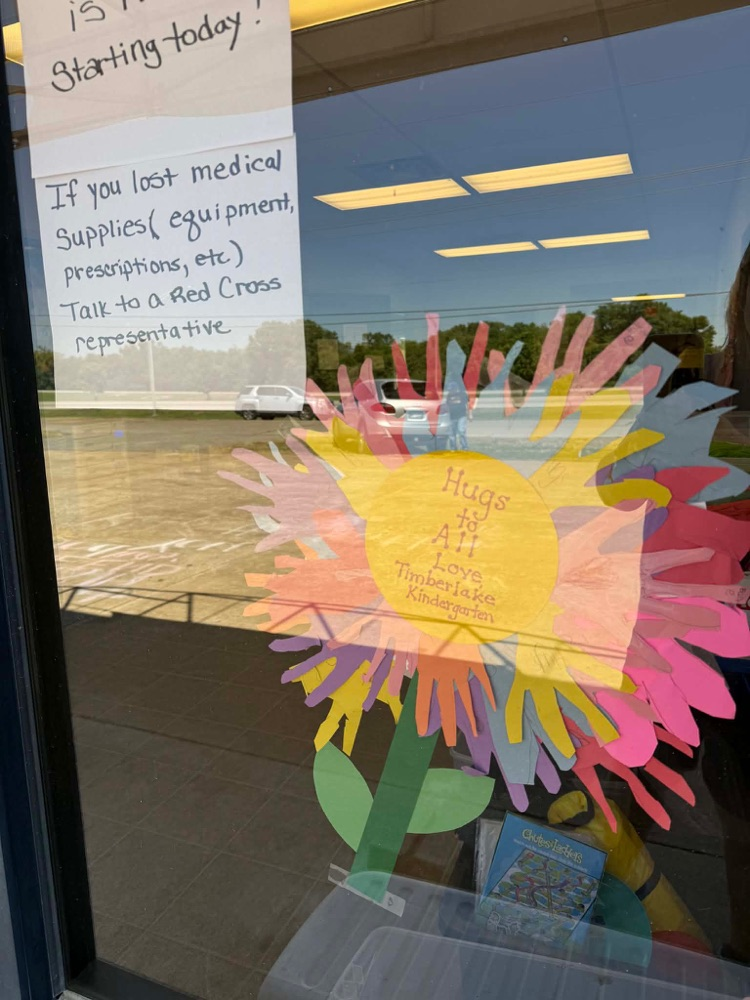 flower made with traced cutouts of students hands