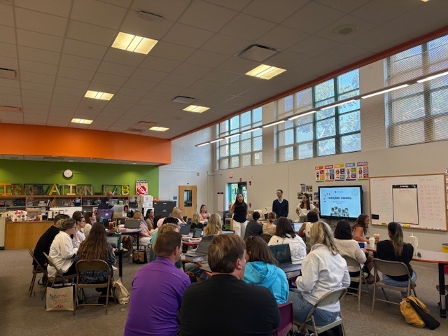 teachers in the media center receiving professional devlopment