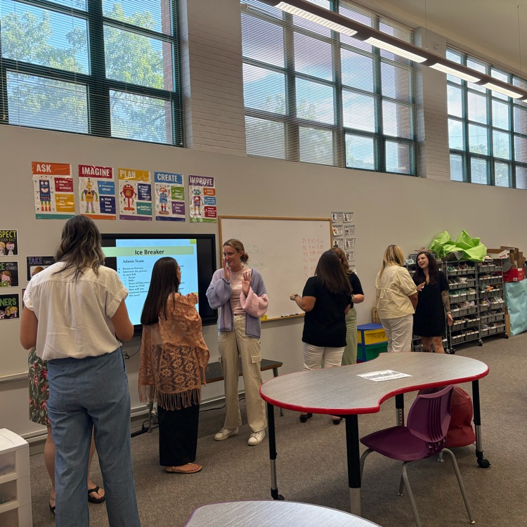 picture of teachers participating in ice breakers 
