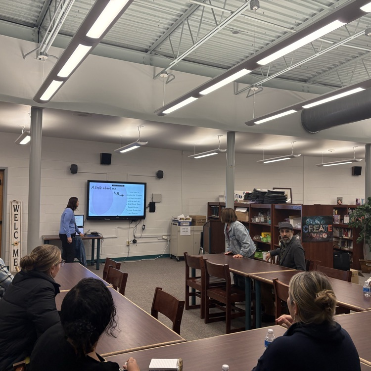 parents in the media center getting to know the director of special services