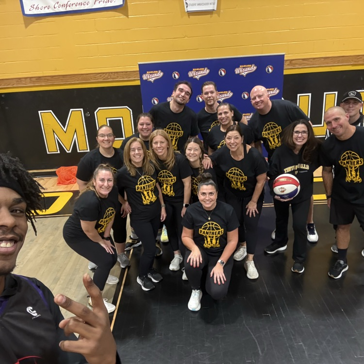 team of teachers getting ready to play basketball