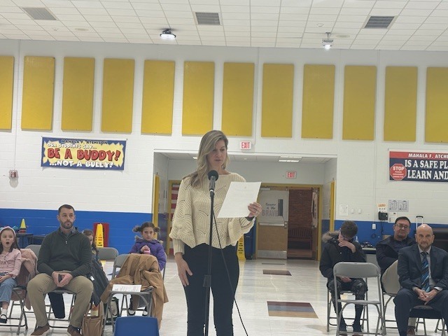 Dr. Lora Smith Staines Board Member Reading Oath of Office