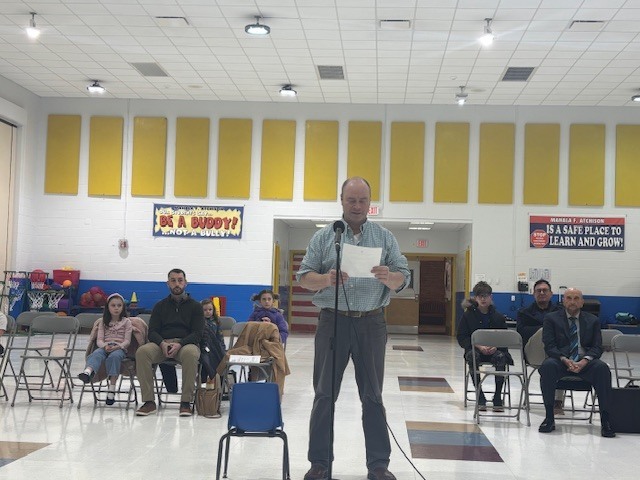 John Livingood Board Member Reading Oath of Office