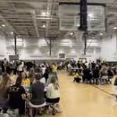 staff sitting in the cafeteria at Tfms
