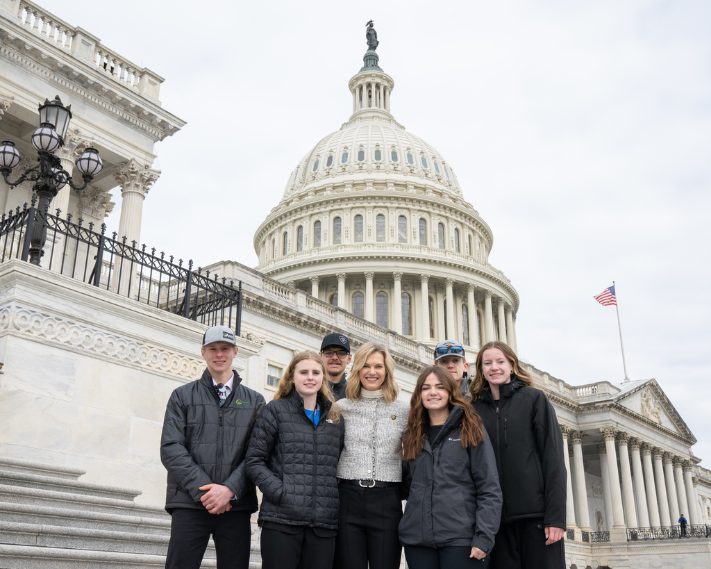 Students posing with Julie Fedorchak