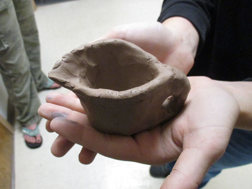 Pinch pot pitcher