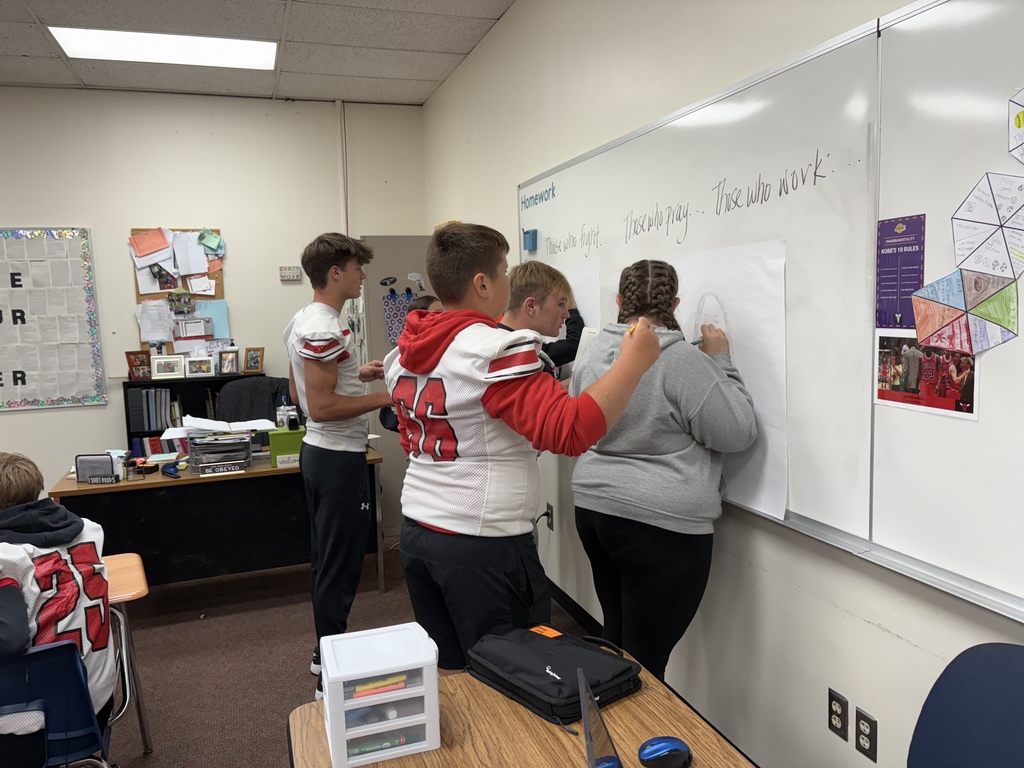 TMS students in ELA work on a project.